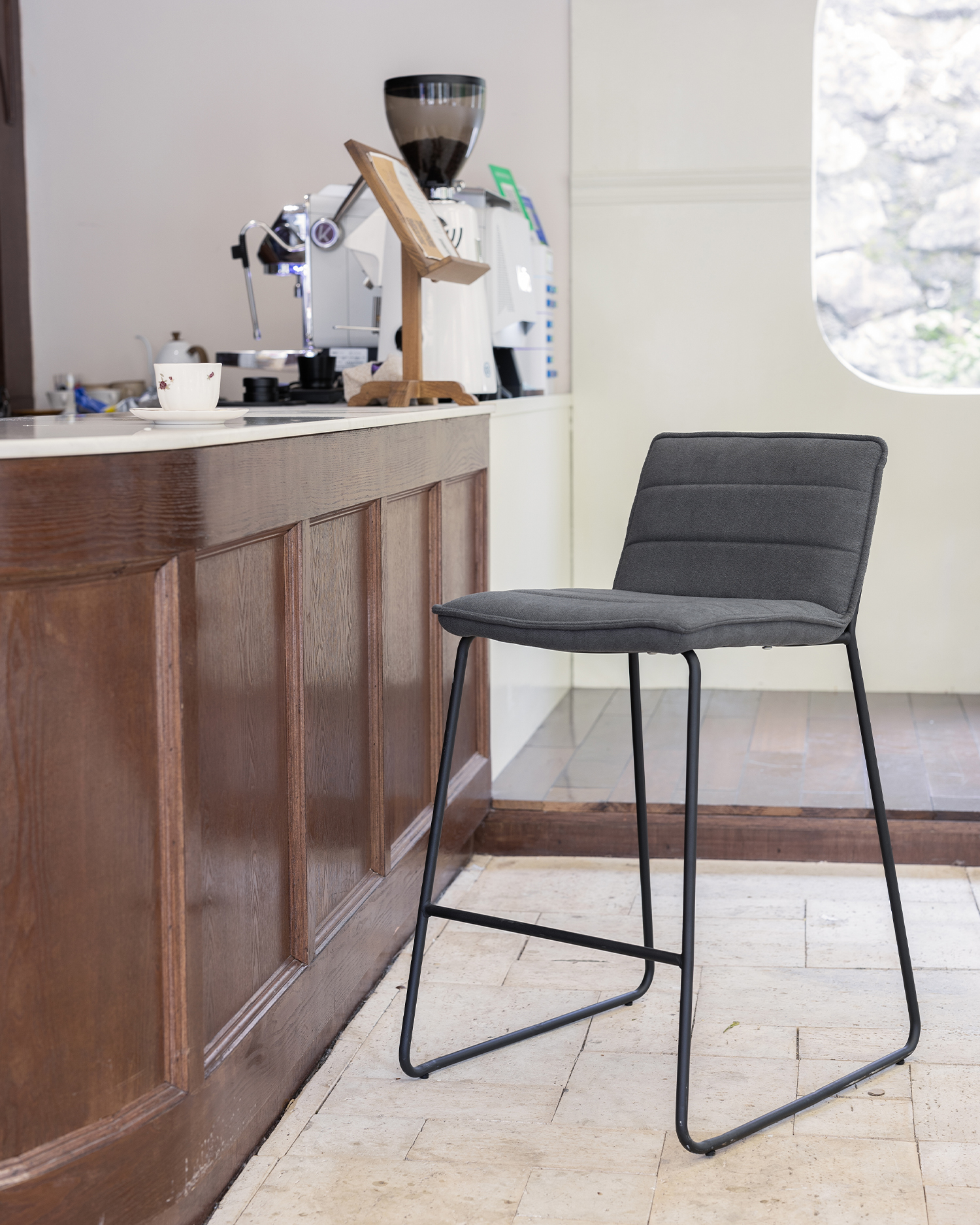 Upholstered grey barstool Upholstered grey barstool